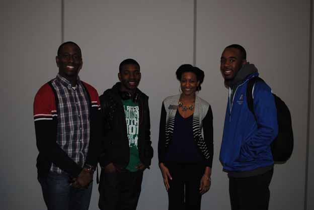 A group of people standing together posing for a photo