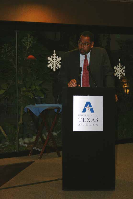 A person speaking at a podium