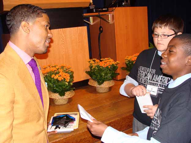 A person talking to a young person