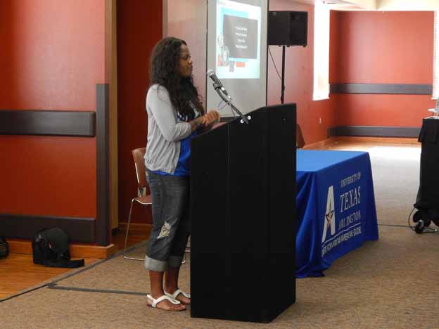 A person standing at a podium
