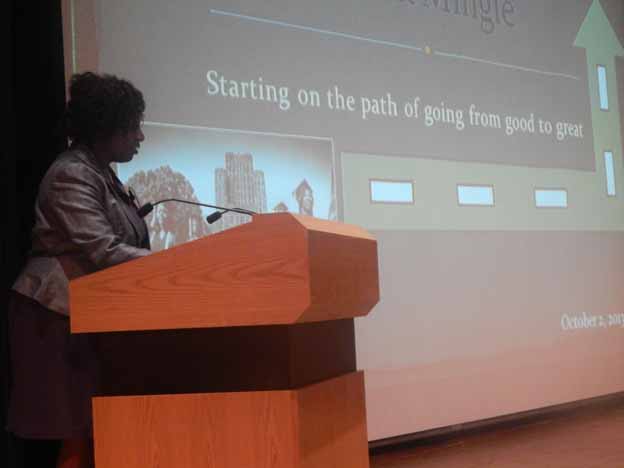 A person standing at a podium
