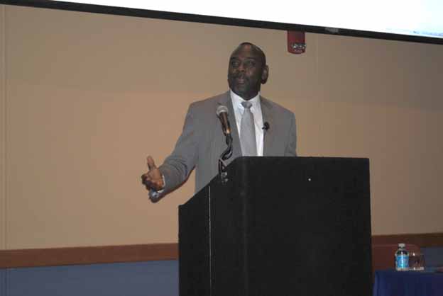 A person giving a speech at a podium