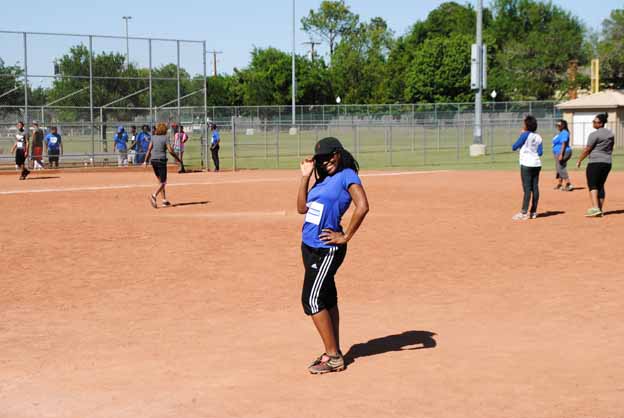 A person standing on a dirt field