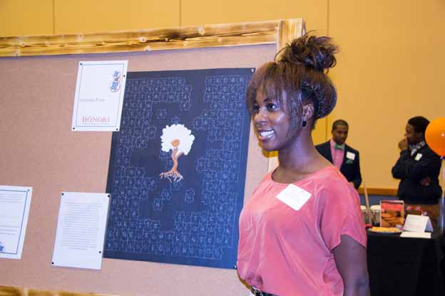A person near a piece of art