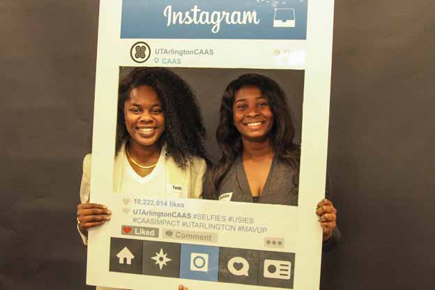Two people posing as social media feed for a photo