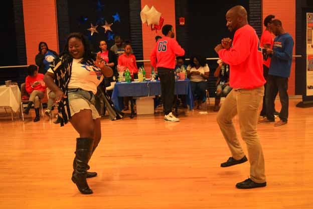 A couple of people dancing