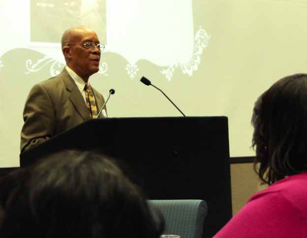A person standing at a podium