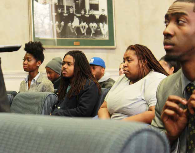 A group of people sitting in a room