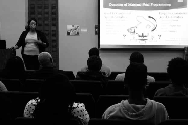 
A person giving a presentation to a group of people