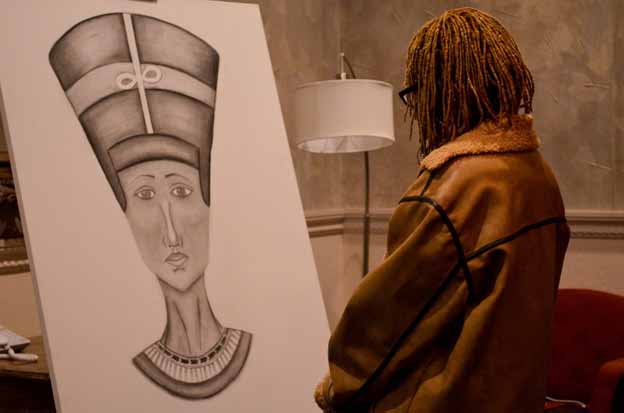 A person looking at a drawing of a person