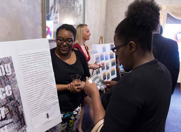 A women looking at a poster